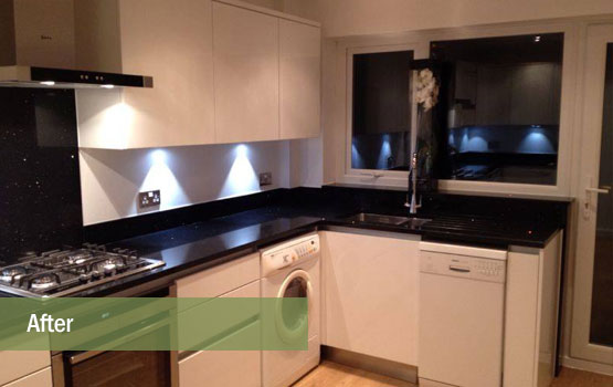 View showing new kitchen incorporating clients existing white appliances.