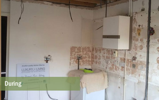 Old kitchen is out and old artexed ceiling removed.