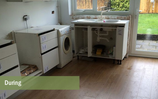 Stunning oak flooring to complement the white gloss doors.